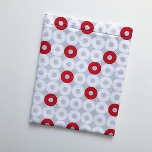 Grey and orange circles book sleeve
